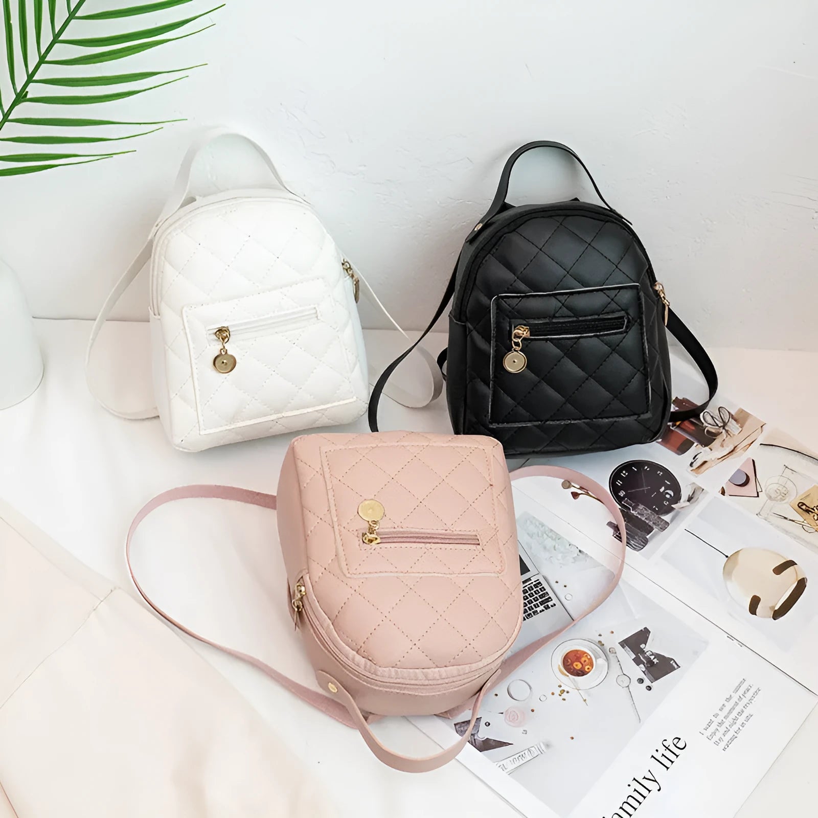 Girls' square hard PU backpack with embroidery, soft handle, in white, black, or pink.