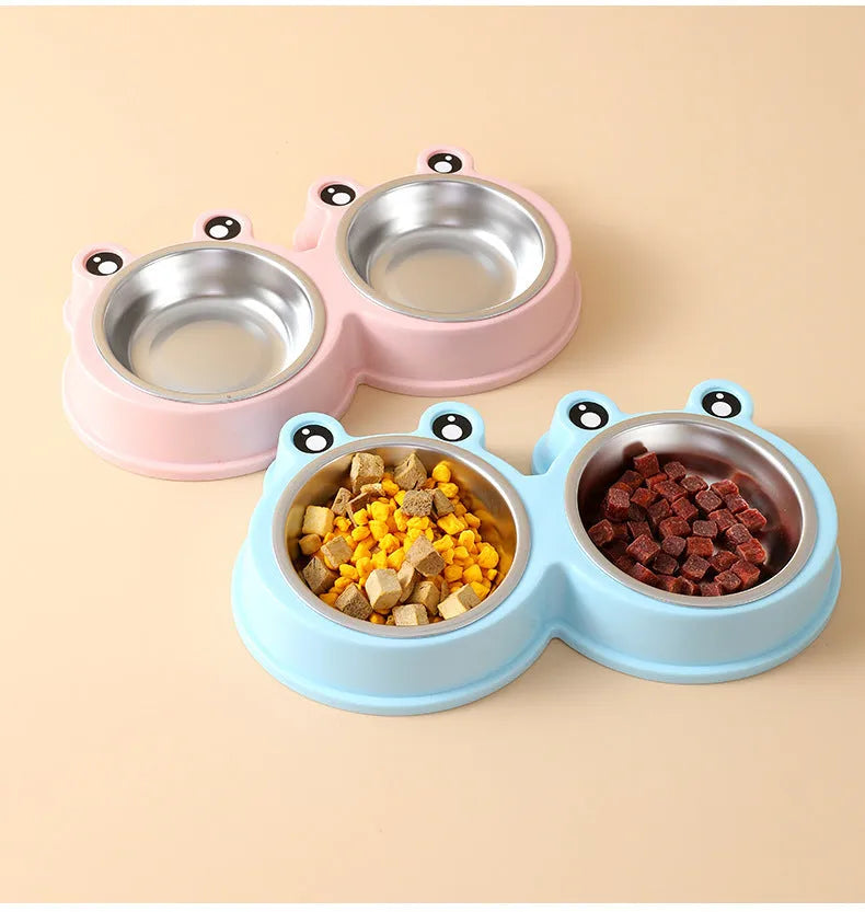 Stainless steel pet double bowl with frog design for cat and dog food and water.