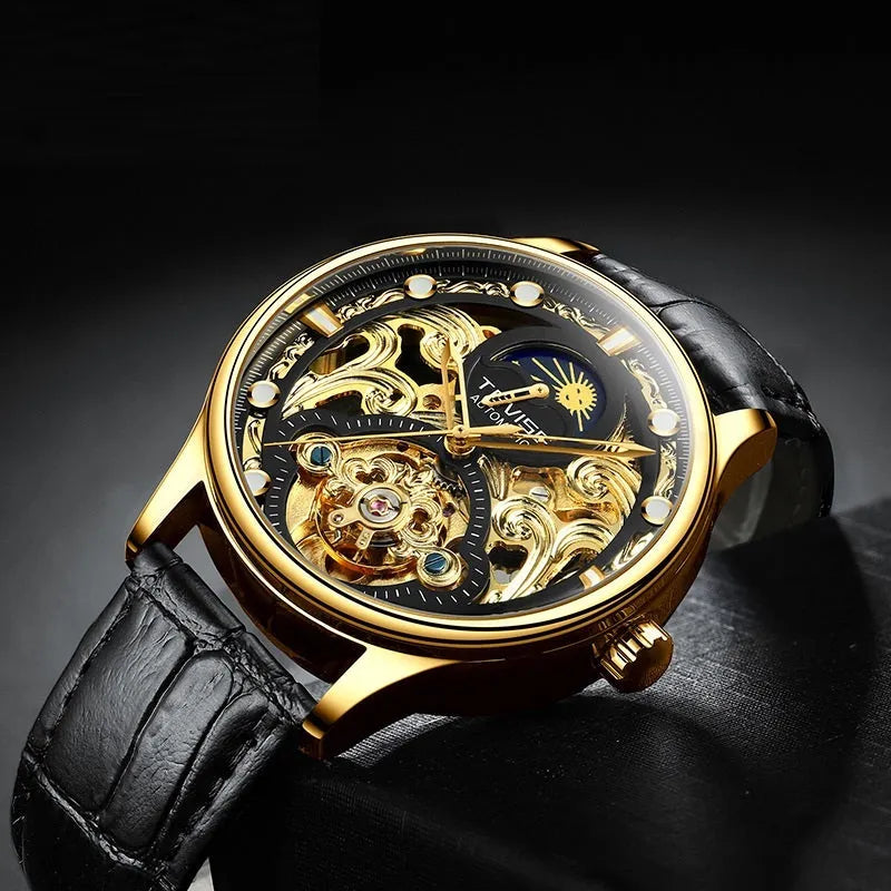 Gold leather strap men's automatic mechanical watch on wrist showing business style.