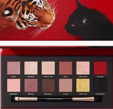 Explorer twelve-colour animal eye shadow palette showing Golden Tiger, Wild Leopard, and Red Fox shades