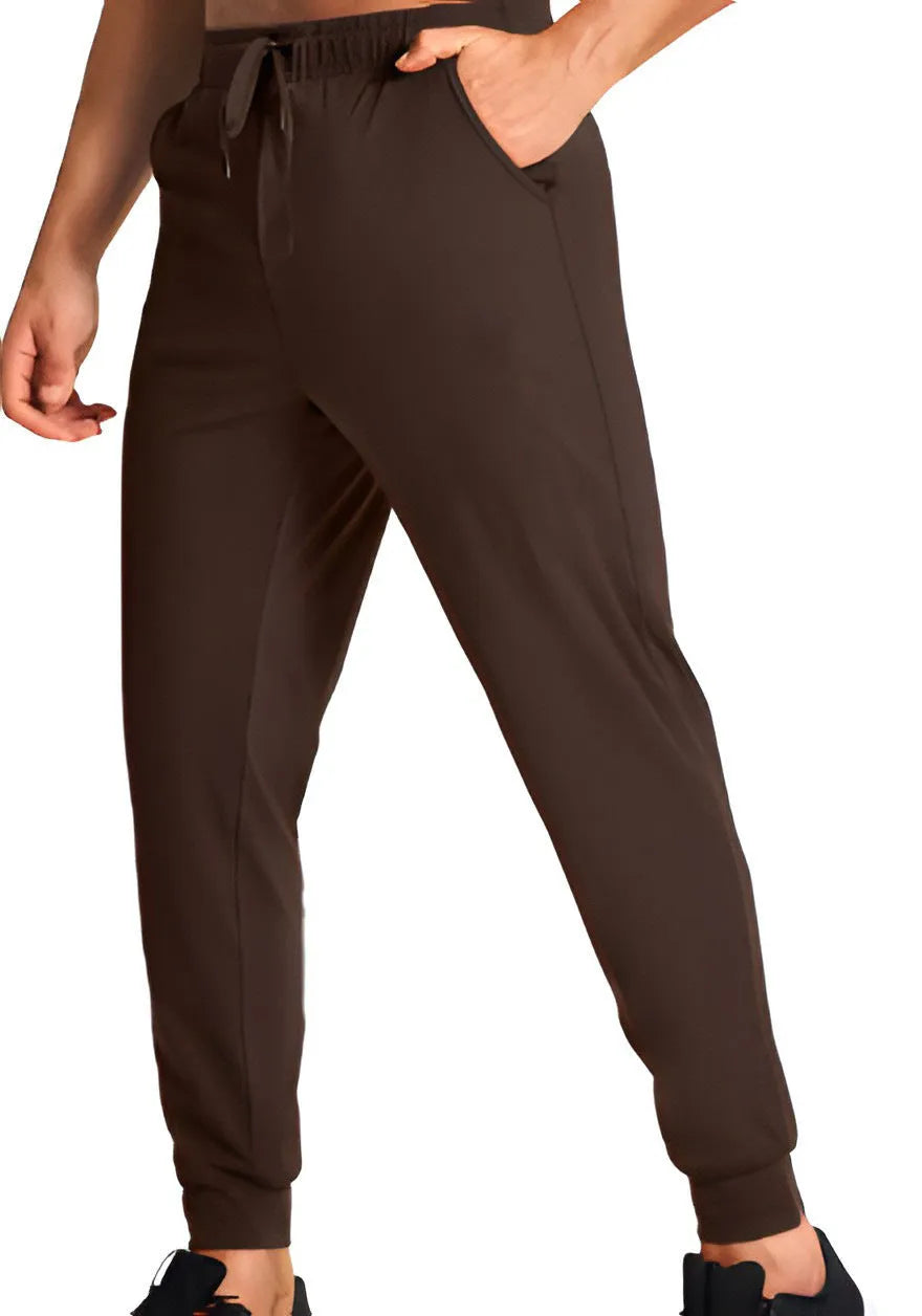 Men's loose fit polyester trousers in solid colour available in multiple sizes