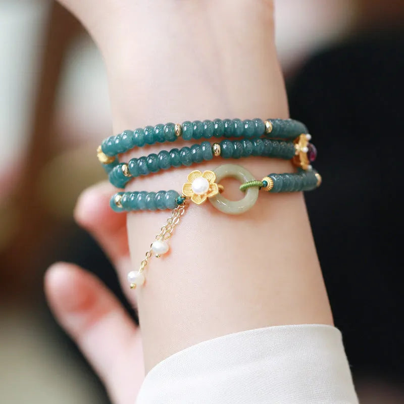 Blue water jade abacus bead bracelet with tourmaline rings and pearls on elastic string