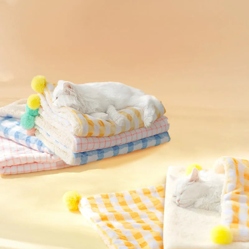 Blue coral fleece pet blanket shown on a dog bed, with size options S, M, L, XL displayed.