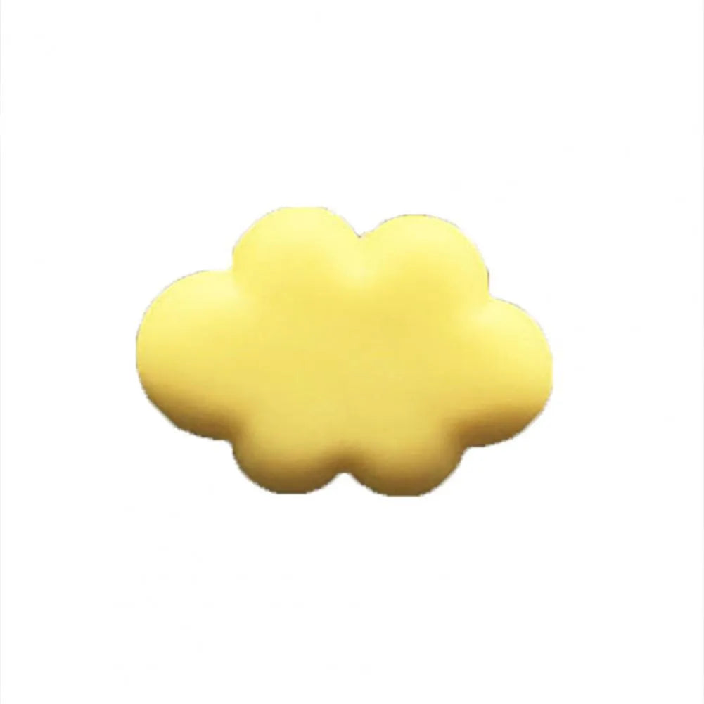 Resin Baiyun cartoon car fragrance clip in light green colour attached to a car air vent