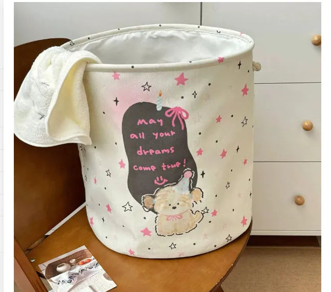 Foldable cotton laundry basket in Baby Bear and Rabbit design collapsed and unfolded showing storage capacity