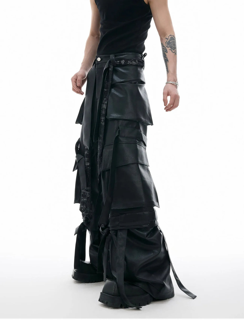 Black loose fit leather trousers with quilted stitching detail and multiple pockets