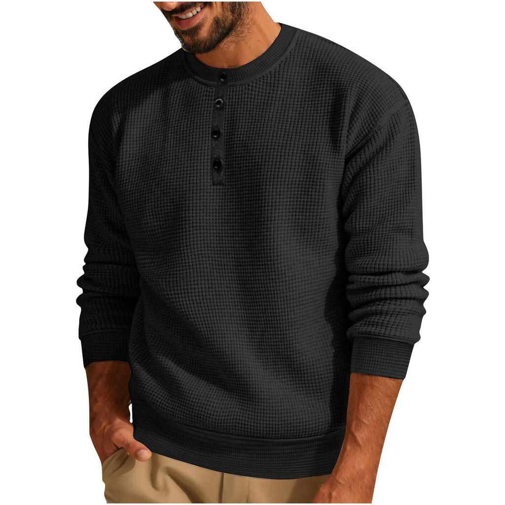 Solid colour long sleeve waffle Henley shirt for men in loose fit, shown in Black