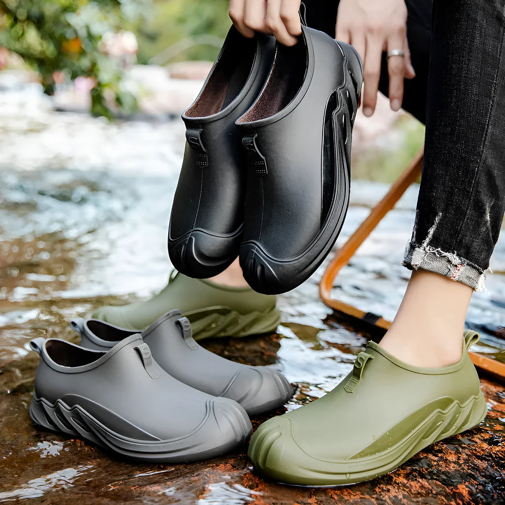 Men's plastic rain boots in solid colours with casual design for wet weather wear