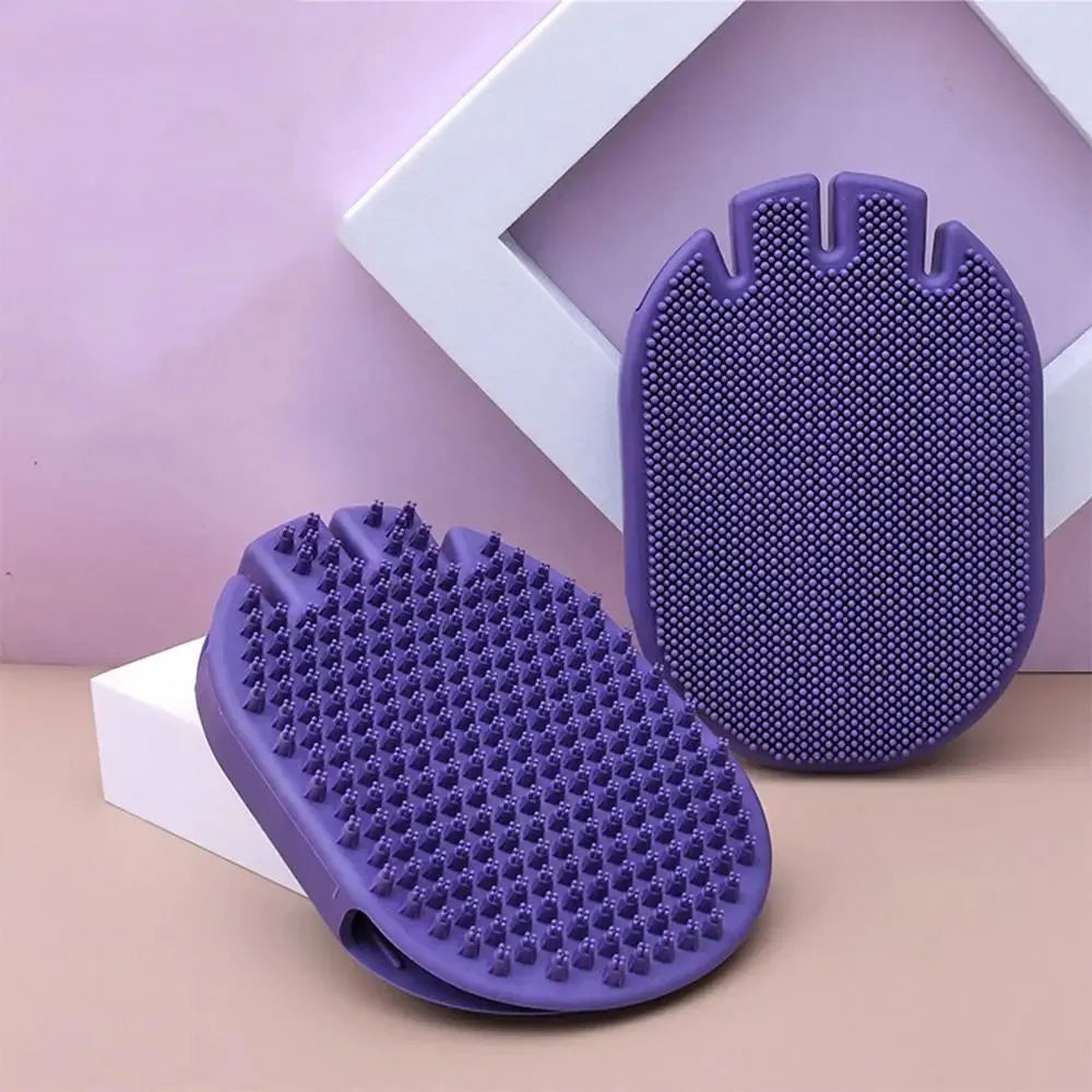 Purple dual-sided pet shampoo massage brush with soft TPR bristles and ergonomic handle.
