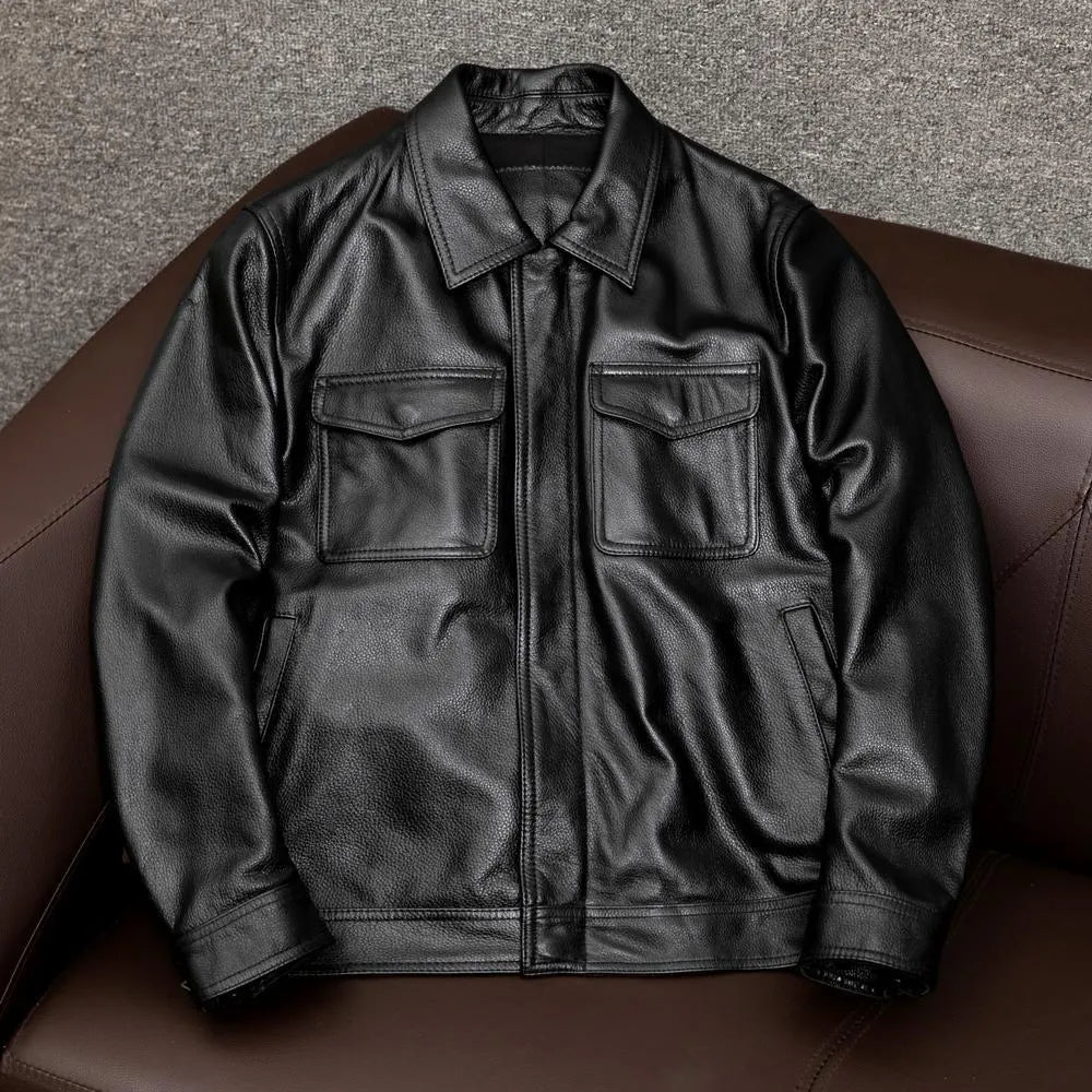 A man's black lapel short leather jacket with side pockets, shown in a loose fit.