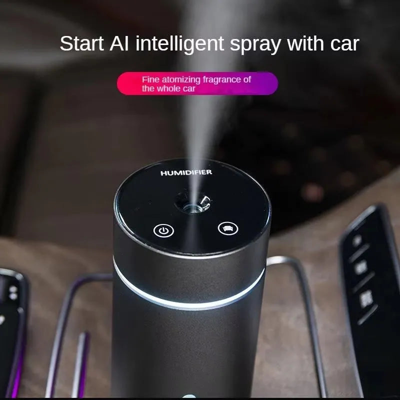 Black aluminium portable car humidifier and essential oil diffuser with night light on a desk