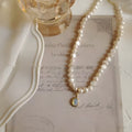 French Court vintage pearl necklace with adjustable length and electroplated alloy construction