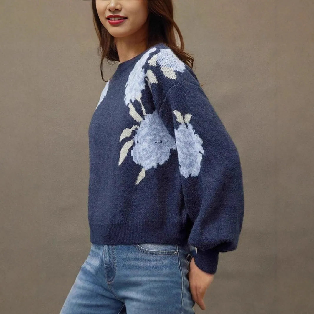 Sapphire blue women's pullover with floral jacquard pattern and off-neck design