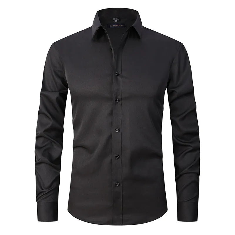 Man wearing a grey stretch long sleeve polyester work shirt, showing fit and collar detail.