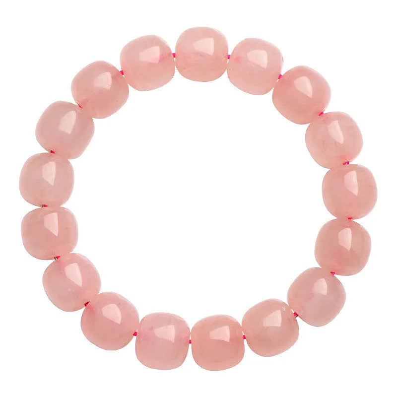 Natural pink crystal bracelet with geometric barrel-shaped beads measuring 8-10mm