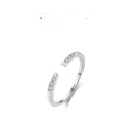 Diamond-studded silver ring with adjustable opening, geometric shape, available in gold or silver colour