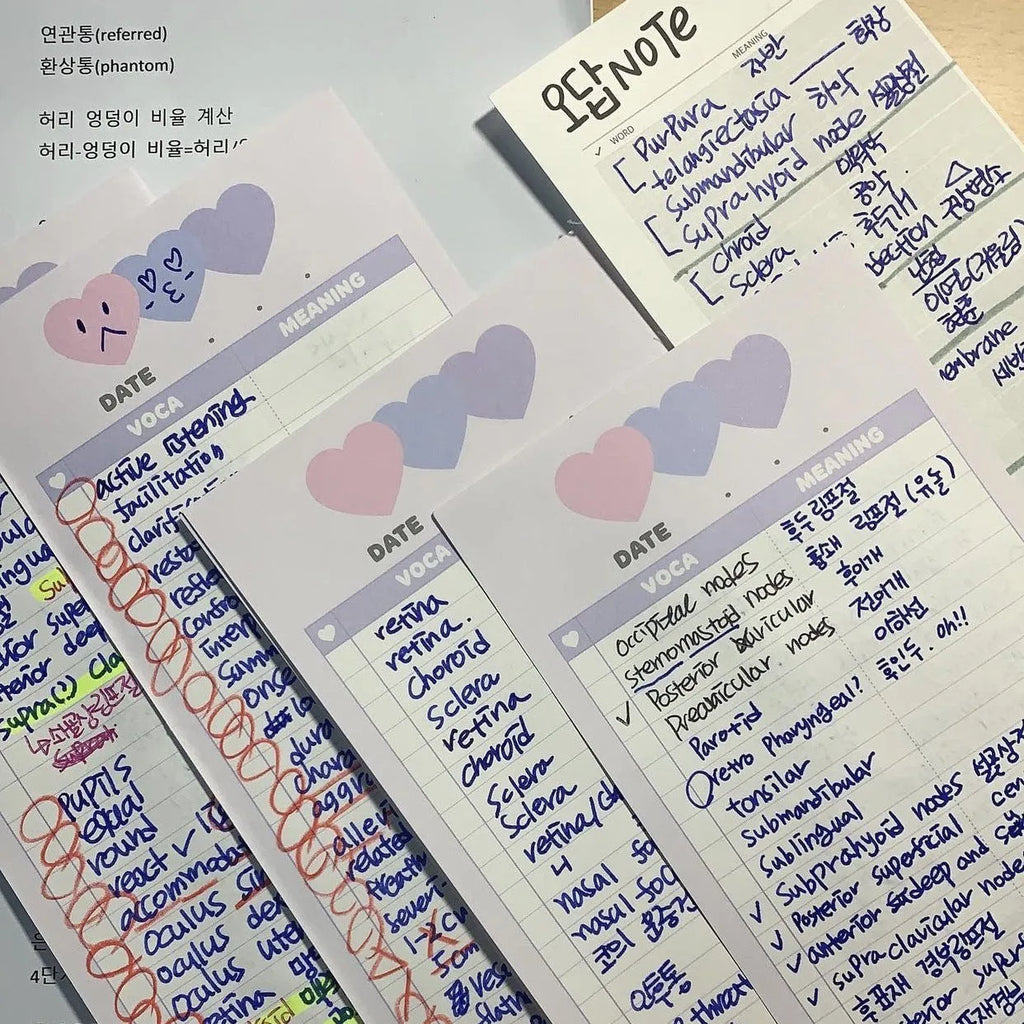 Half-B5 size notepad with English words, shown in pink, purple, and blue cover colour options.