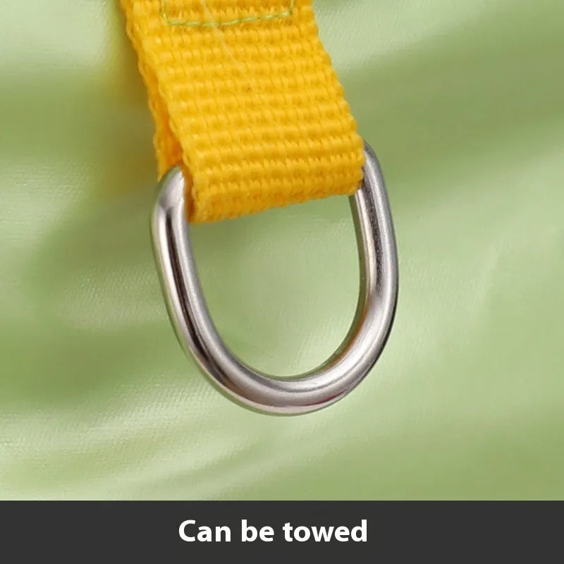 Green waterproof four-legged dog coat on a pet, showing full torso and leg coverage.