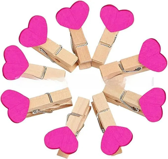 Set of five handmade solid wood heart-shaped clips in red, white, yellow, pink, and rose red.