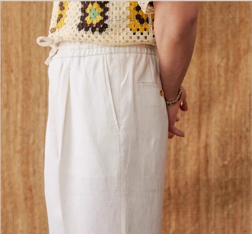 Women's linen trousers with elasticated high waistband in loose straight-leg cut