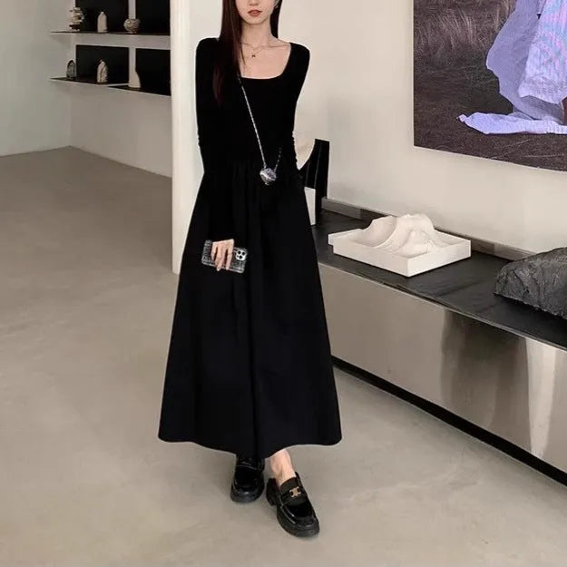 Women's black square collar knitted dress with long sleeves, elastic waist, and A-line long skirt.