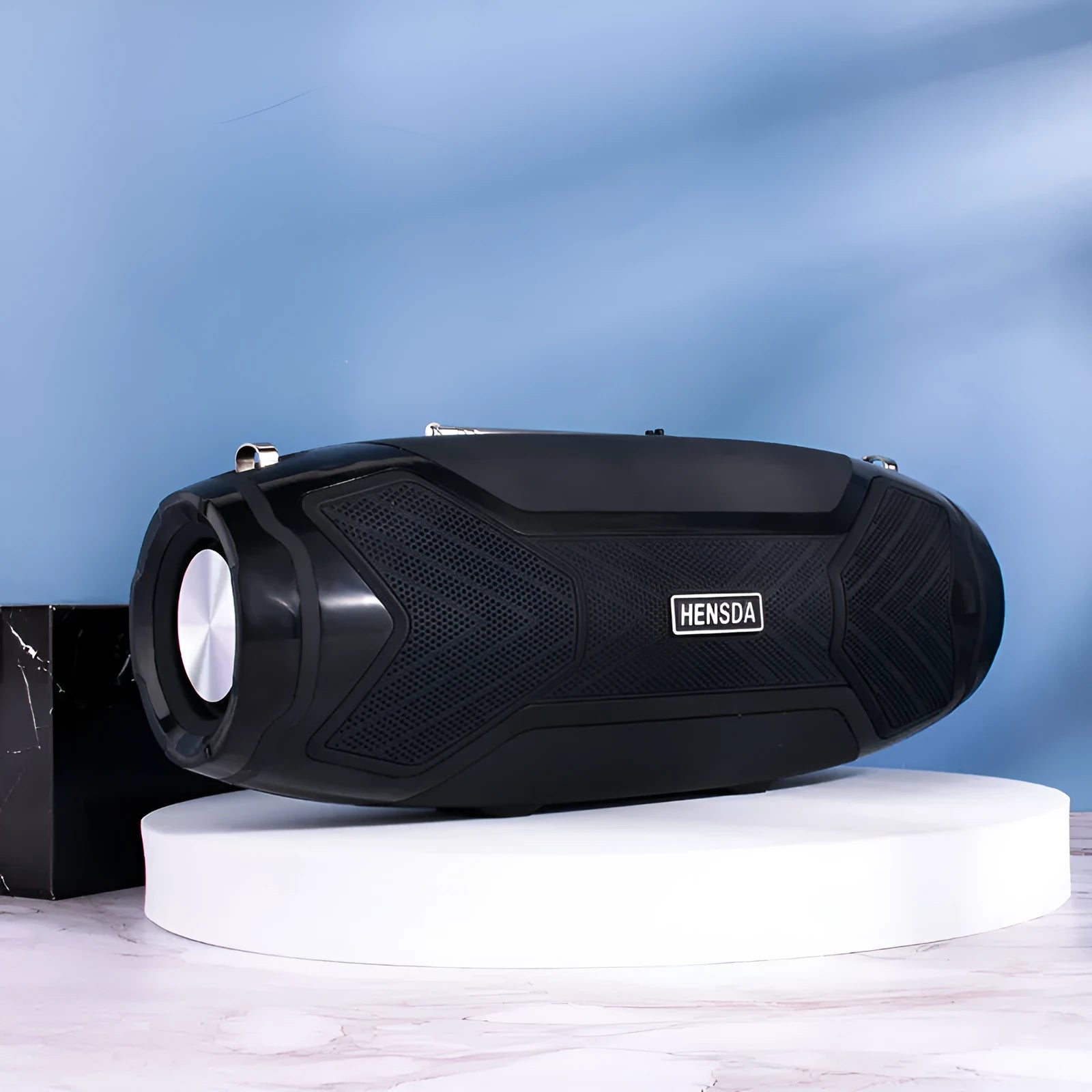 Compact portable Bluetooth speaker in multiple colours with buttons, USB port, and splash-resistant plastic casing.
