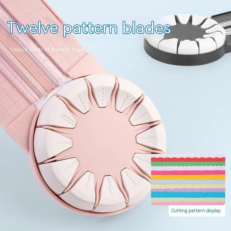 Pink and black 12-in-1 multifunctional plastic paper cutting machine on a white background.