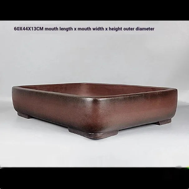Handmade rectangular purple clay flower pot with antique finish showing substantial size