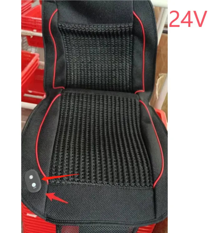 Black car ventilation seat cushion showing minimalist design and power cord
