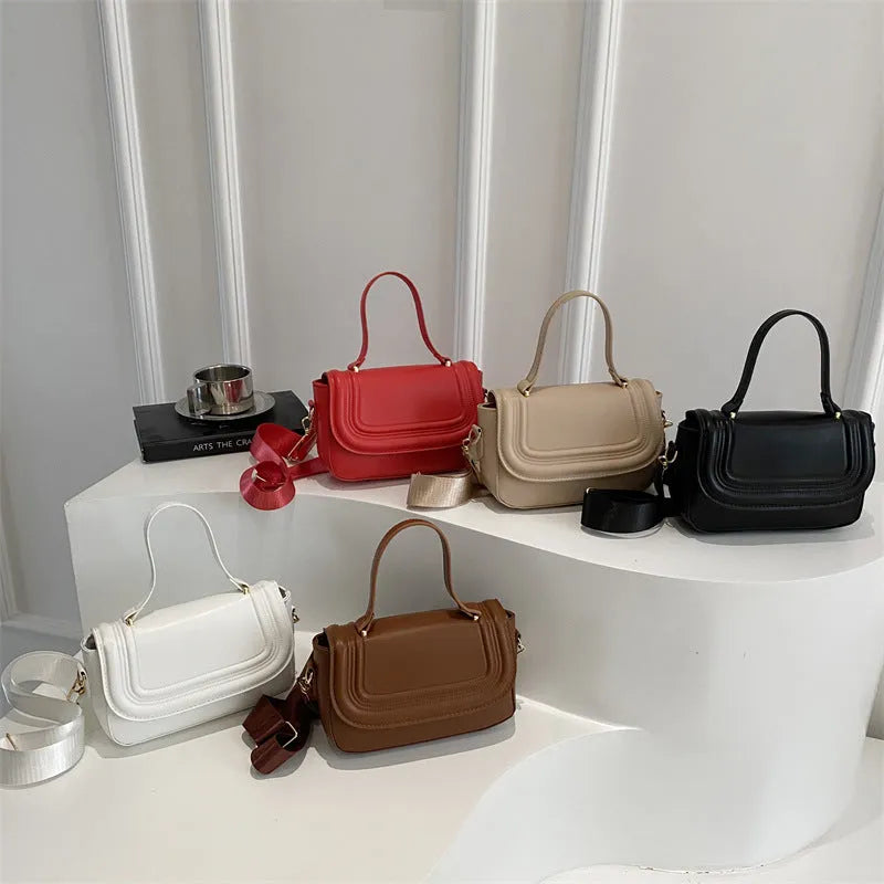 Women's casual PU one-shoulder crossbody bag in black with urban simplicity sewing line detail and sandwich pocket