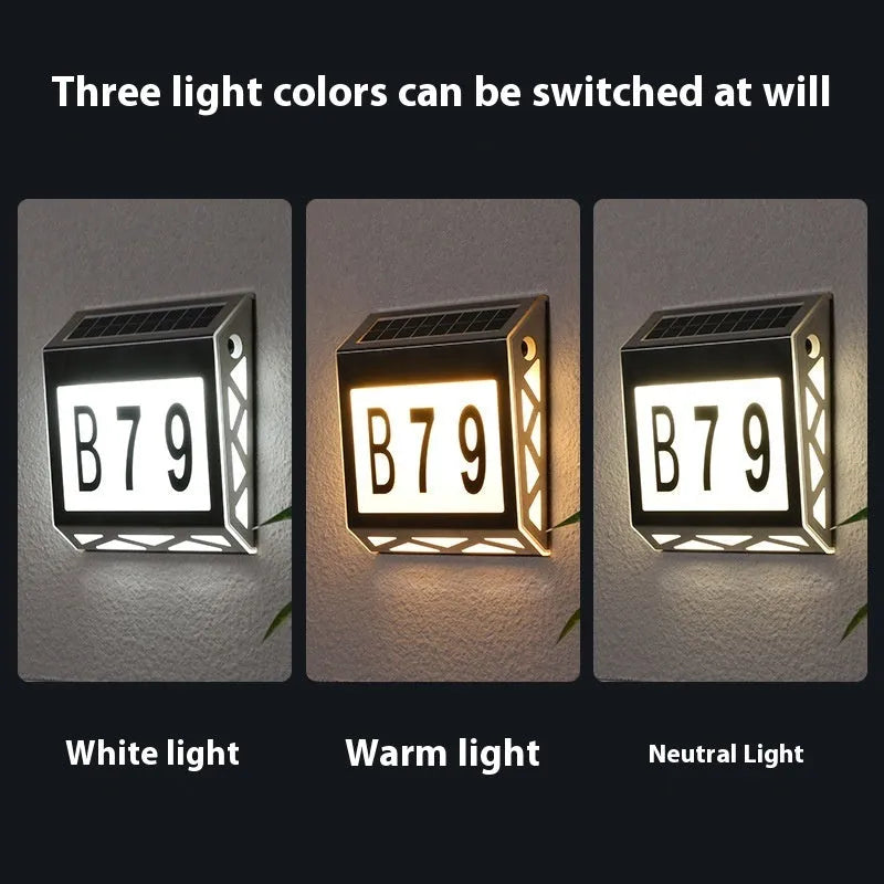 Solar powered waterproof doorplate light in black or silver with LED illumination for house numbers
