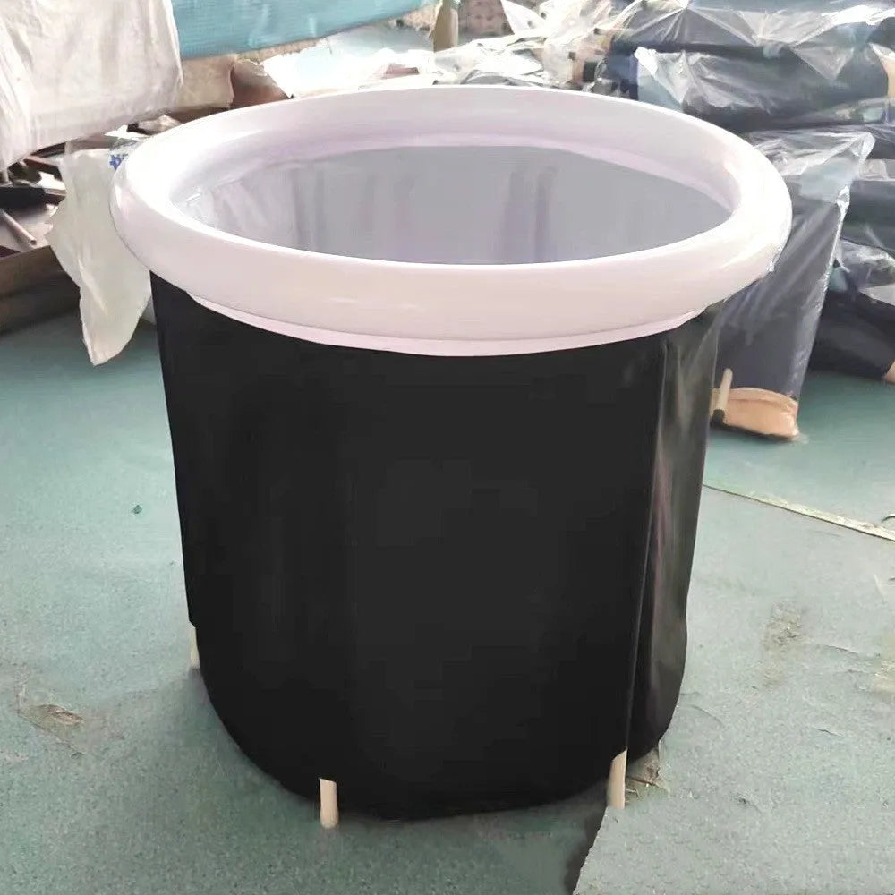 Black portable inflatable ice bath tub with weather lid for recovery therapy