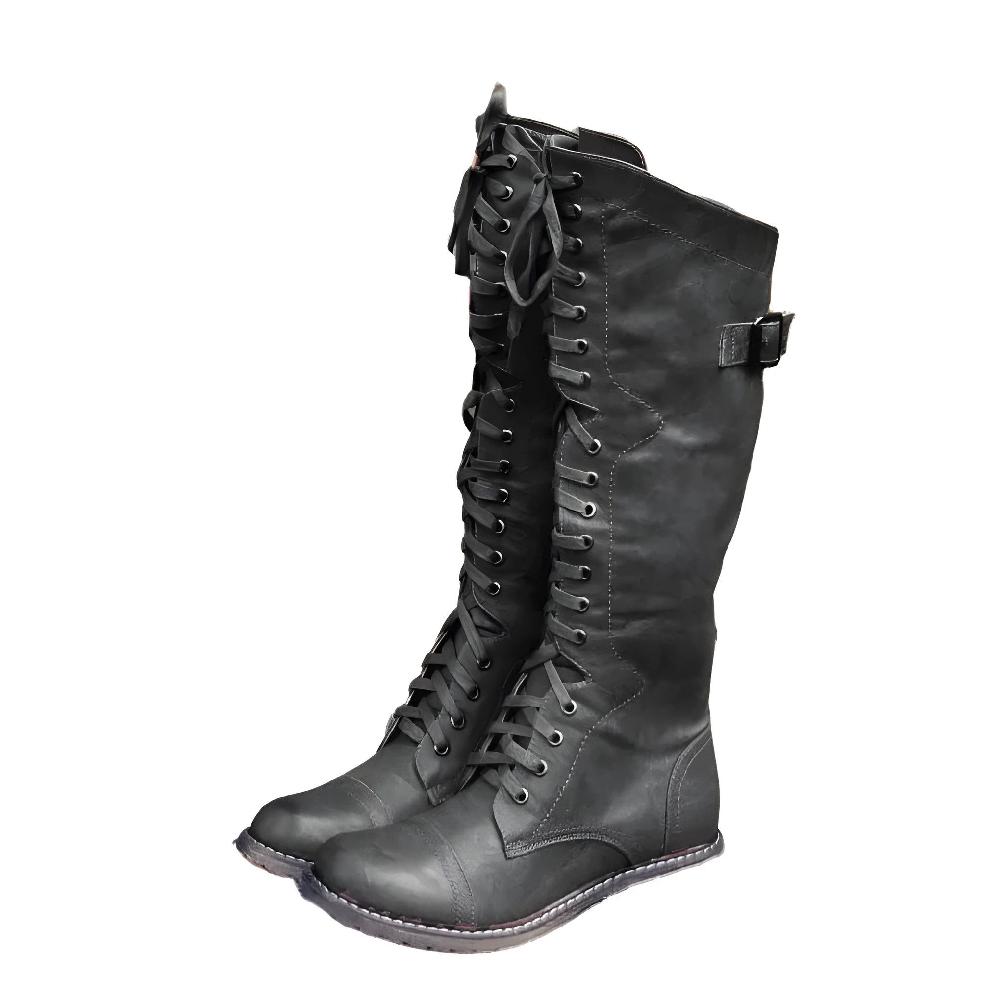 Women's black knee-high boots with a cross-strap buckle and elastic back panel.