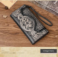 Retro brown embossed Chinese floral pattern on a genuine leather tri-fold women's wallet.