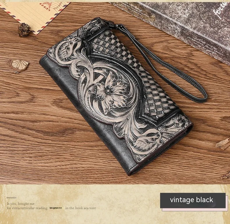 Retro brown embossed Chinese floral pattern on a genuine leather tri-fold women's wallet.