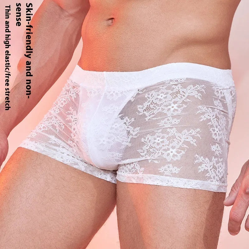 Men's black lace boxers made from nylon fabric, showing lace detailing on a free-size brief.
