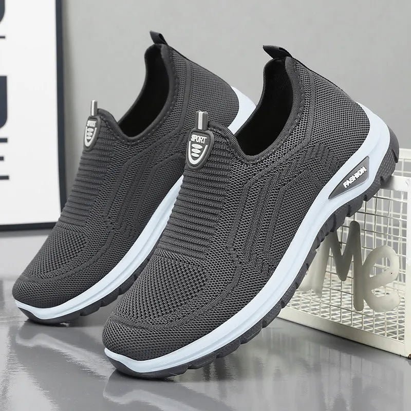 Men's black and grey breathable casual shoes with mesh lining and flat sole.