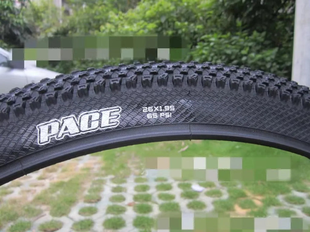 Ultralight puncture-proof mountain bike tyre showing tread pattern and sidewall in available sizes