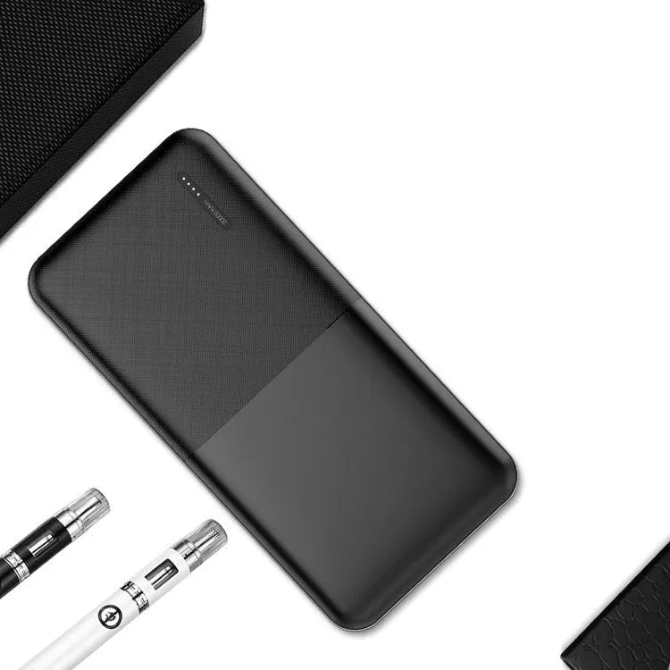 Black and white 20000 mAh power bank with multiple USB ports and plastic casing