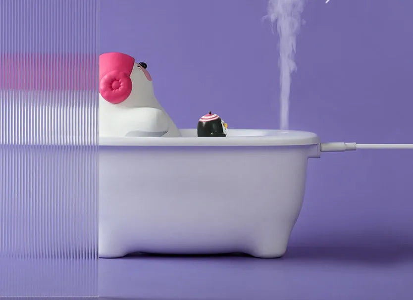 White creative USB air humidifier and aromatherapy diffuser unit on desk