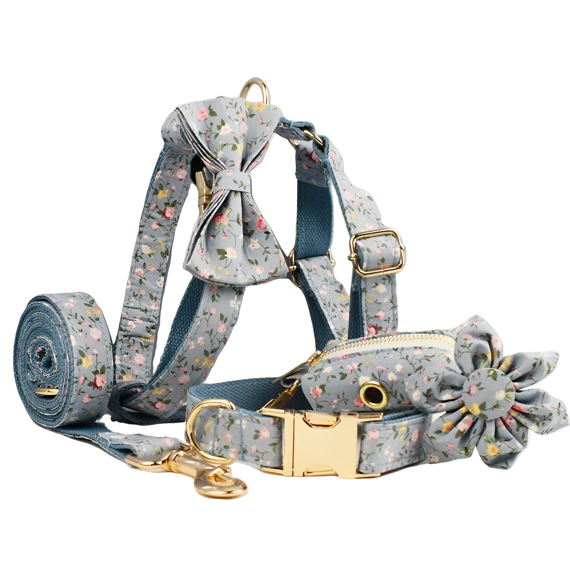 Blue floral patterned dog collar and matching leash, bow, vest, and poop bag set on a white background.