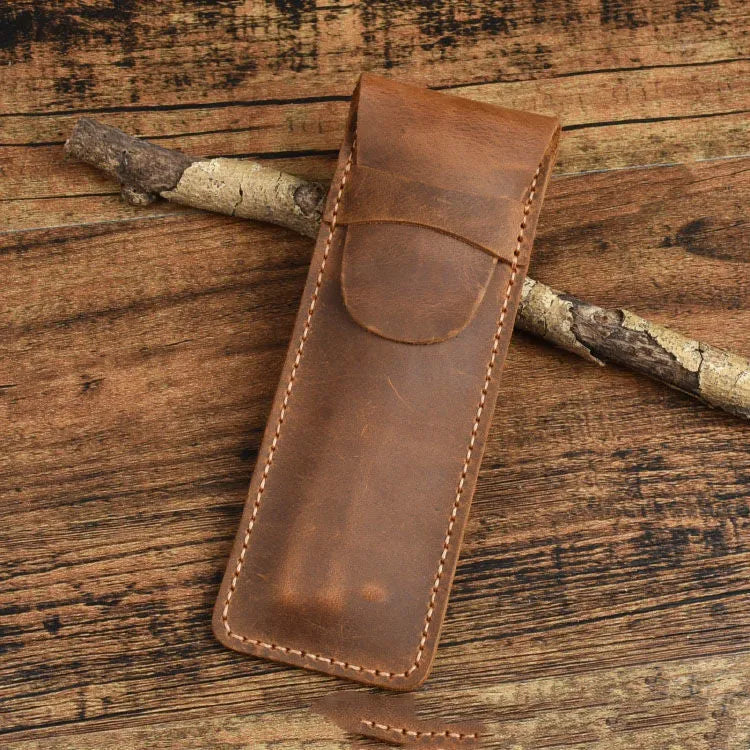 Brown vintage leather pencil case measuring 16x6cm open showing interior