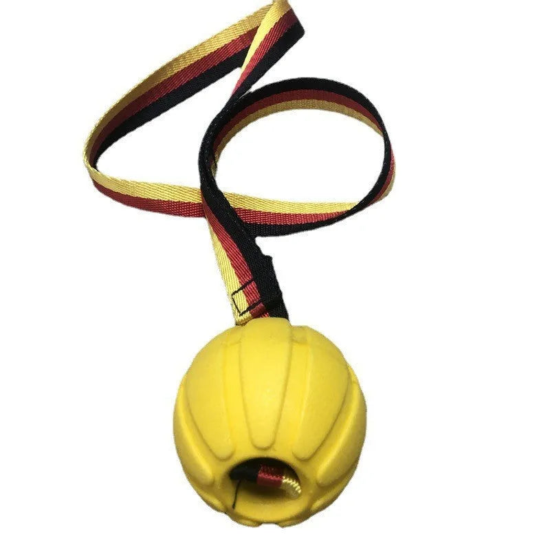 Yellow and camouflage coloured EVA floating dog tetherballs in different sizes on a blue background.