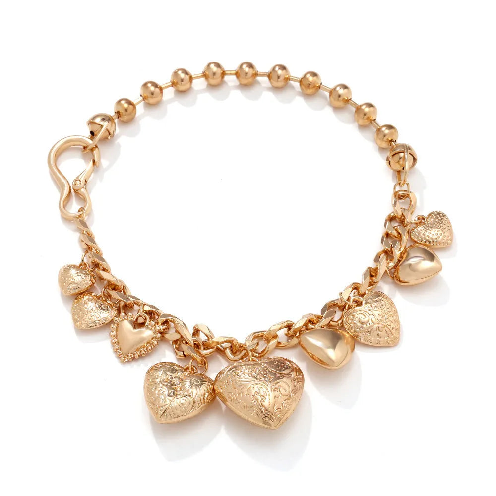 Exaggerated carved heart pendant necklace on metal chain with adjustable 41-50cm length in gold finish