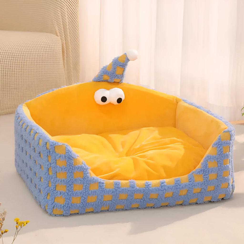 Green triangular cat bed with a thick sponge pad and removable fabric cover.