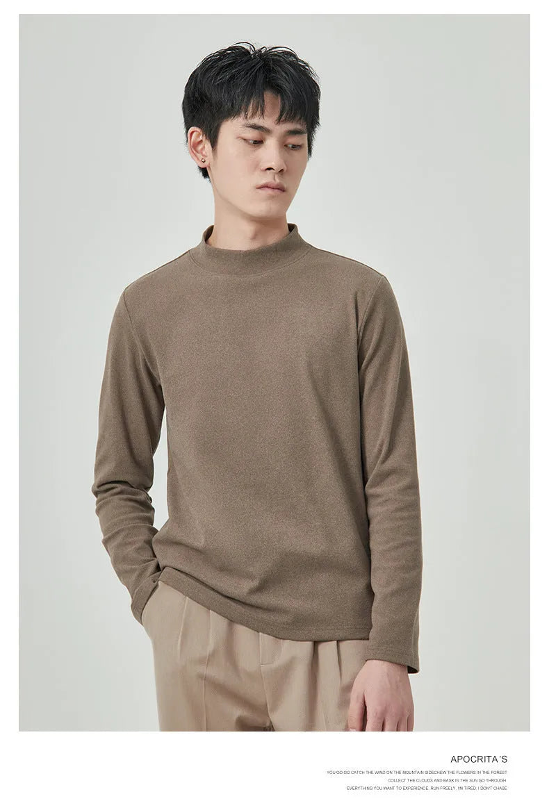 Men's solid colour Dralon half-high collar long sleeve t-shirt on a hanger.