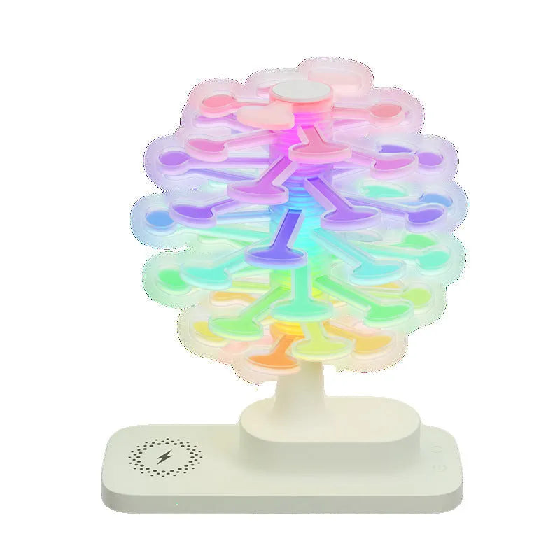 White spiral tree LED table lamp with geometric design on wooden desk