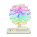 White spiral tree LED table lamp with geometric design on wooden desk