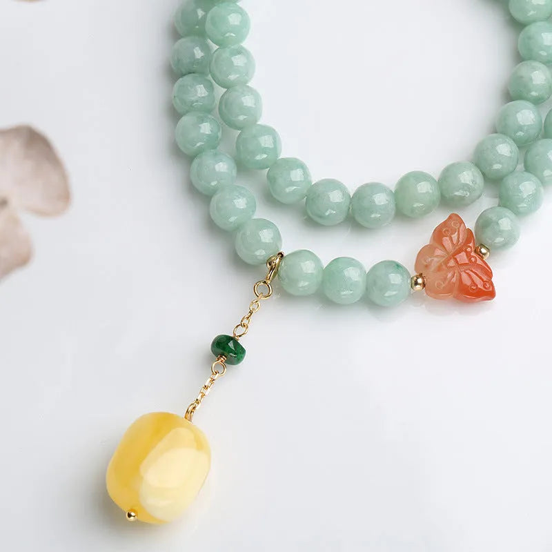Double-layer women's bracelet with jade round beads and hanging beeswax barrel beads in retro geometry design