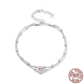 Sweet girlish heart-shaped 925 sterling silver bracelet on wrist, colour BSB152.